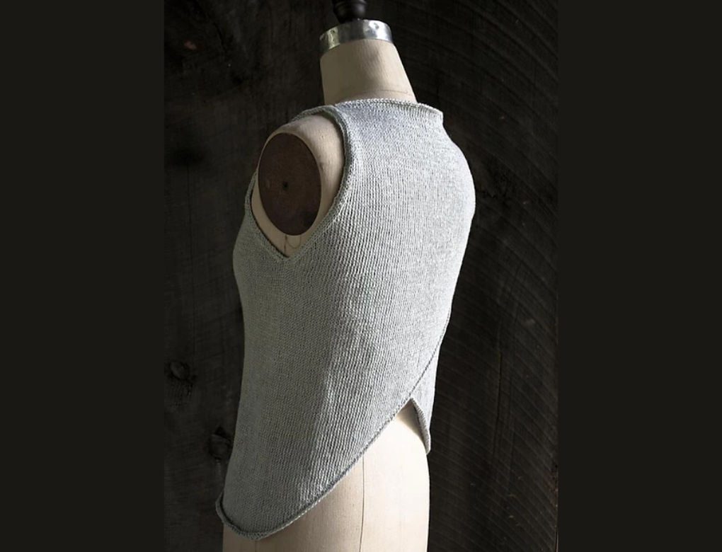 top in maglia elegante con dettaglio sul retro